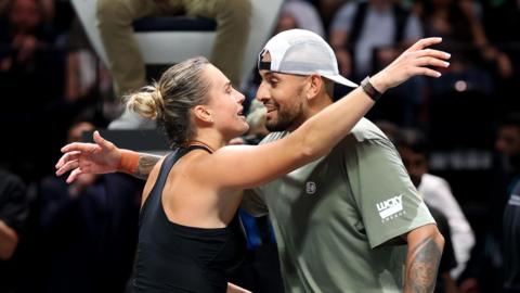 Aryna Sabalenka and Nick Kyrgios hug