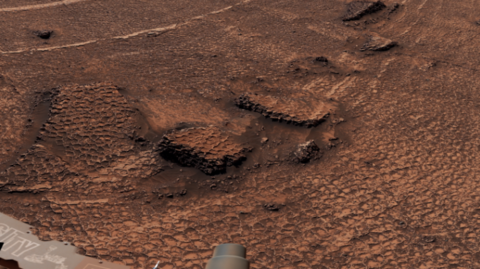 Image captured by the rover showing the honeycomb shapes in the surface
