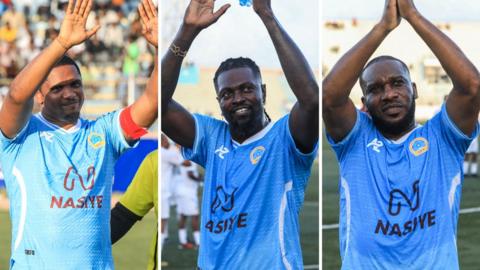 A triptych showing Samuel Eto'o, Emmanuel Adebayor and Jay Jay Okocha wearing light blue football tops and waving to the crowd from the pitch at the Mogadishu National Stadium