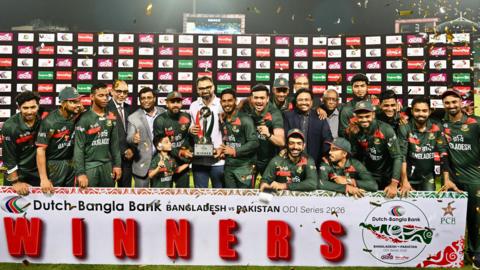 Bangladesh celebrate with the ODI series trophy