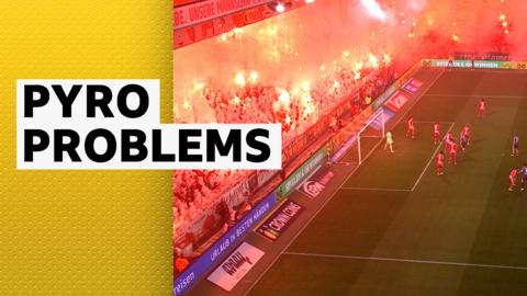 Union Berlin fans with flares