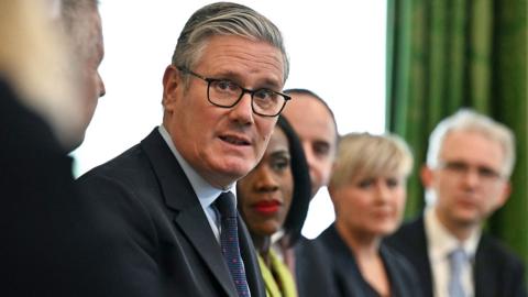 Keir Starmer in a cabinet meeting at Downing Strreet looking stressed.