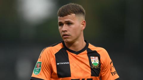 Zak Brunt in action for Barnet