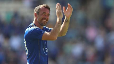 Christian Fuchs clapping