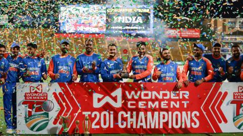 India celebrate with the Twenty20 series trophy