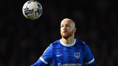 Portsmouth defender Connor Ogilvie in action