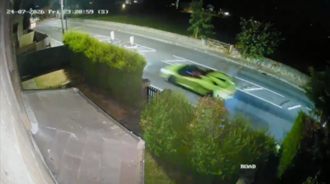 A green supercar spotted on CCTV footage