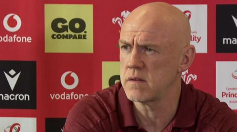 Steve Tandey speaks to the media