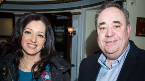 Tasmina Ahmed-Sheikh and Alex Salmond pictured at a press event in London in 2018