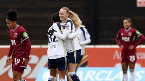 Matilda Vinberg celebrates with Toko Koga
