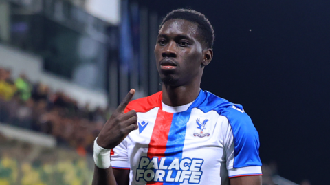 Ismaila Sarr celebrates