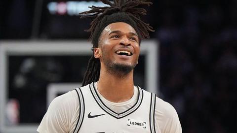 A smiling Stephon Castle in action for the San Antonio Spurs