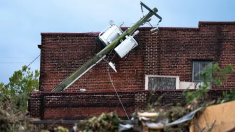 A collapsed power line in Biltmore Village in the aftermath of Hurricane Helene in Asheville, North Carolina