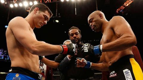 Chris Weidman and Anderson Silva bump fists before a fight