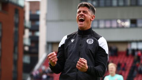 Stevenage boss Alex Revell clenches his fists and screams in delight as his side beat Leyton Orient.