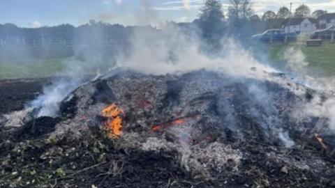 a burnt out bonfire