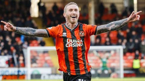 Dundee United's Craig Sibbald celebrates after scoring to make it 3-1 during a William Hill Premiership match between Dundee United and St Mirren at Tannadice Park