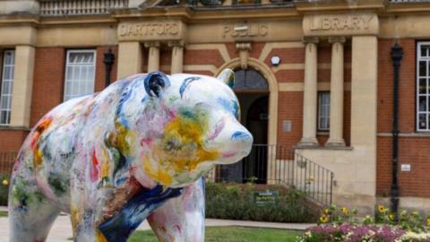 A colourful bear sculpture outside Dartford Public Library.