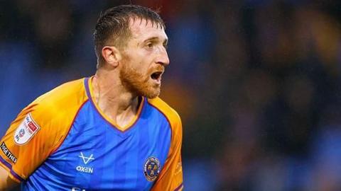 Tom Anderson in action for Shrewsbury Town