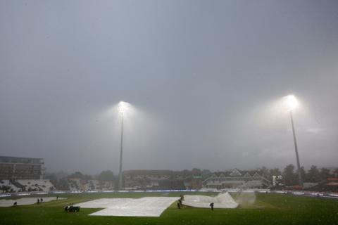 Rain covers come in during the second women's ODI between England and Pakistan