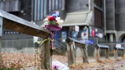 Flowers left at the scene in Shoreham