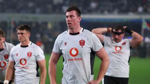 Wales' Adam Beard looks dejected