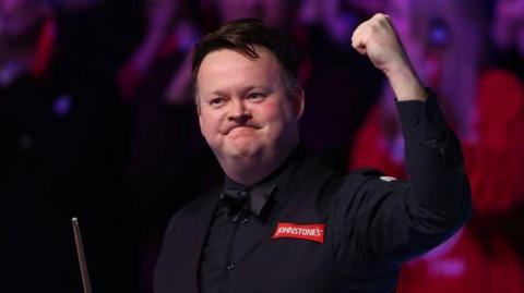 Shaun Murphy celebrates making a 147 at the Masters