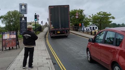 Lorry being driven over Potter Heigham Bridge