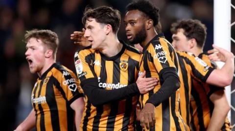 Hull City players celebrate Abu Kamara's second-half goal in the victory over Plymouth Argyle