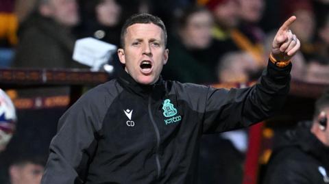 Bradford City goalkeeping coach Colin Doyle shouts instructions from the sidelines.