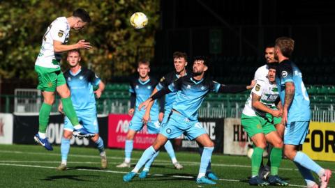 Danny Davies scores a header for The New Saints