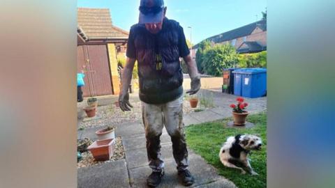 Gareth Parry-Jones with mud up to his knees