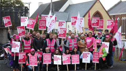 BT employees including emergency call handlers take part in a strike in County Armagh on 6 October