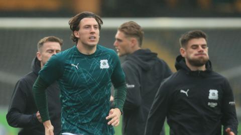 Plymouth players before kick-off
