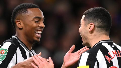 Newcastle's Joe Willock and Miguel Almiron celebrate scoring against Manchester United