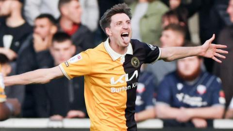 Burton's Jake Beesley sticks in his tongue out in celebration