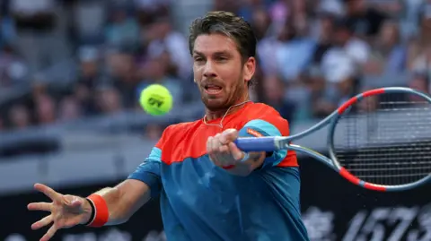 Cameron Norrie celebrates