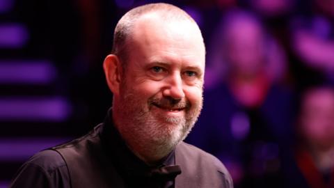 Mark Williams smiles to the crowd