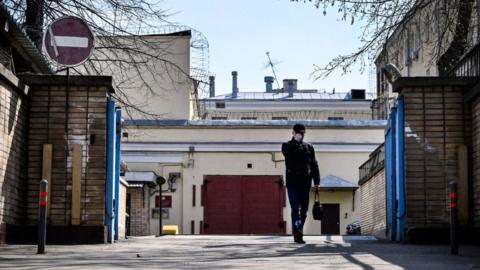 A man walks in front of the entrance to the Lefortovo prison in Moscow on April 12, 2023.