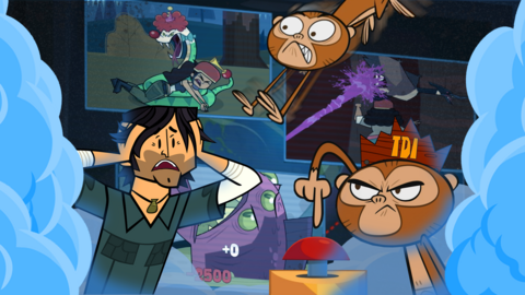 Chris McLean is looking shocked while looking at a monkey pressing a button