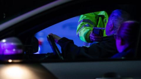 Police breathalyse a driver