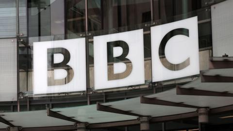 The ý logo at the entrance of Broadcasting House in London