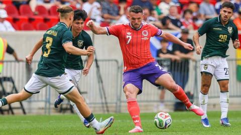 Scotland's John McGinn in action against Bolivia