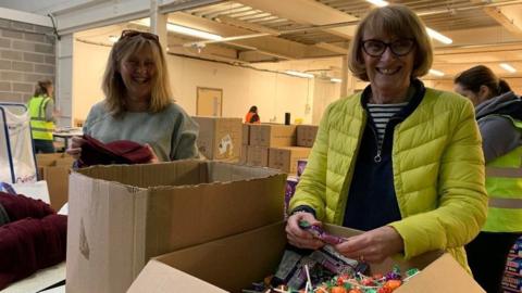 Some of the volunteers at the warehouse in Dorchester