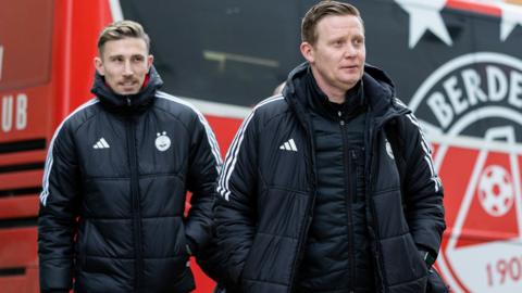 Aberdeen defender Angus MacDonald and manager Barry Robson