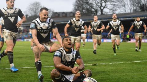 Joe Lovodua celebrates his score