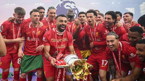 Liverpool lift Premier League trophy