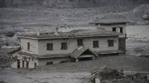 Building submerged in mud in Nepal