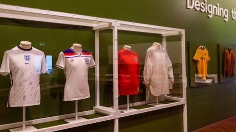 England shirts through the age on display