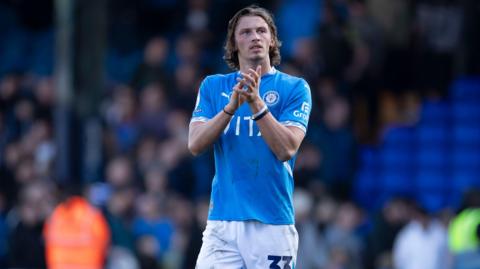 Brad Hills applauding Stockport County fans